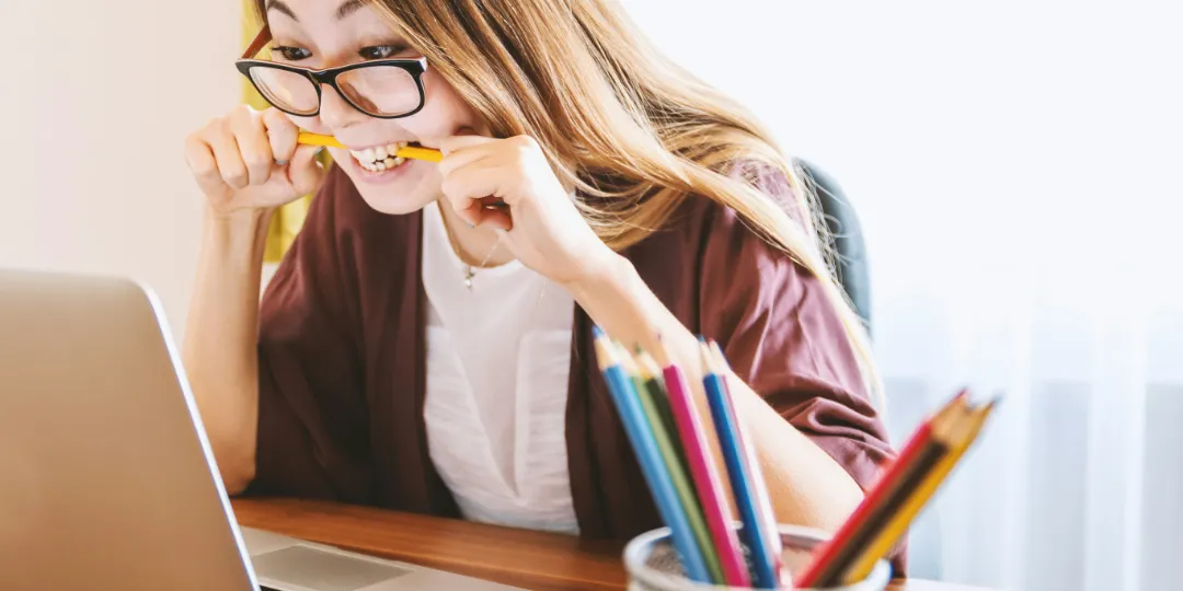 angry woman staring at computer