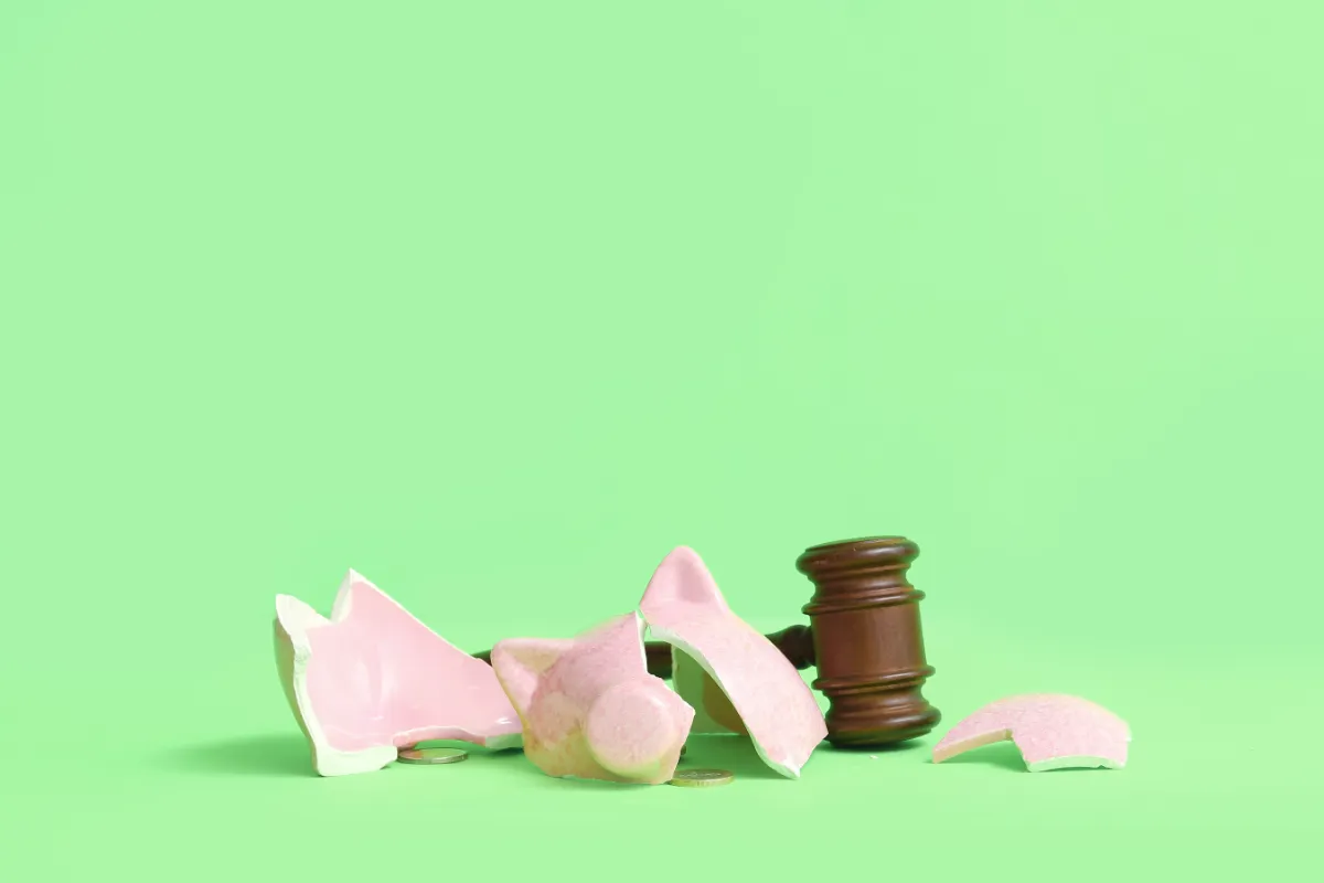 broken piggy bank with hammer