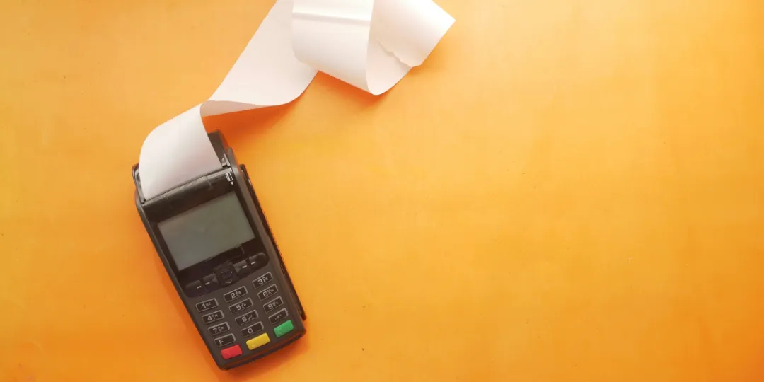 calculator on orange background