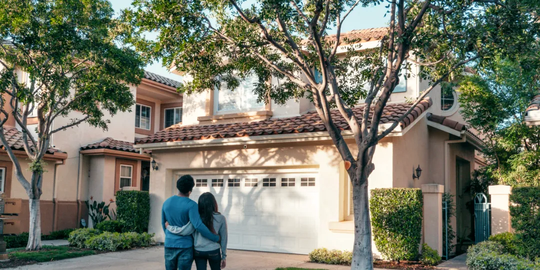 couple looking at house