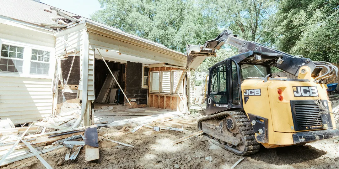 house remodel with digger