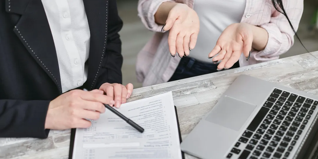 two people discussing a contract