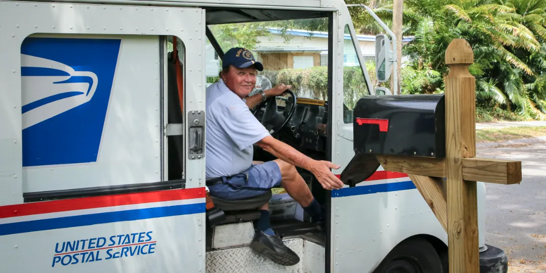 us postman sitting in truck