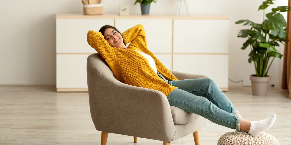 woman leaning back in a chair